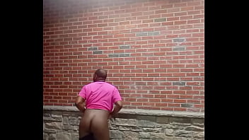 A private strip tease for free while faced backwards in 70 degree weather