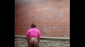 A private strip tease for free while faced backwards in 70 degree weather