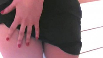 Attractive girlfriend strips in front of camera