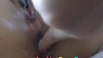 Cute brunette lesbians playing with vibrator on