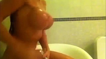 Amateur sexy brunette taking shower on webcam