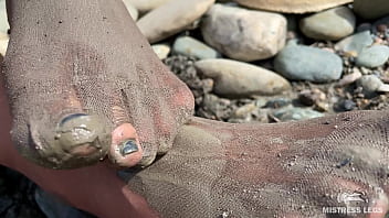 Dirty feet in pantyhose teasing outdoor