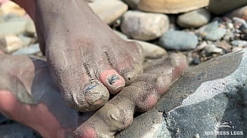 Dirty feet in pantyhose teasing outdoor