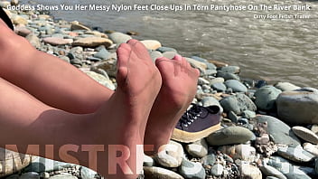 Dirty feet in pantyhose teasing outdoor