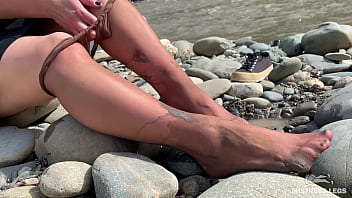 Dirty feet in pantyhose teasing outdoor