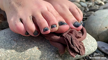Dirty feet in pantyhose teasing outdoor