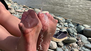 Dirty feet in pantyhose teasing outdoor