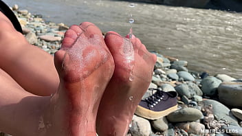 Dirty feet in pantyhose teasing outdoor