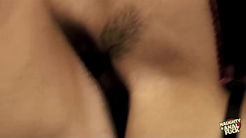 Immigration agents subject the individual with brown hair to simultaneous sexual activity involving the anus and vagina in a threesome