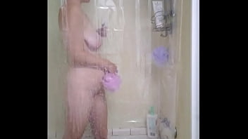 Hot milf with big breasts cleans herself