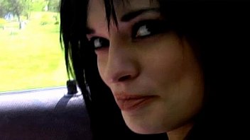 Daring babe flashing her tits in public