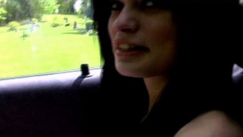 Daring babe flashing her tits in public