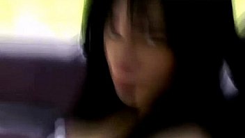 Daring babe flashing her tits in public