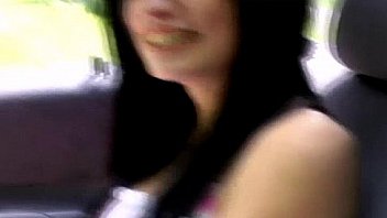 Daring babe flashing her tits in public