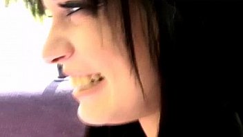 Daring babe flashing her tits in public