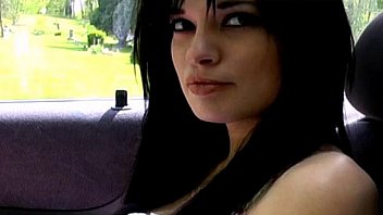 Daring babe flashing her tits in public