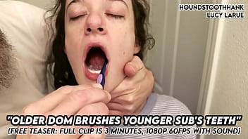 Older dom brushes young subs teeth