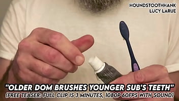 Older dom brushes young subs teeth