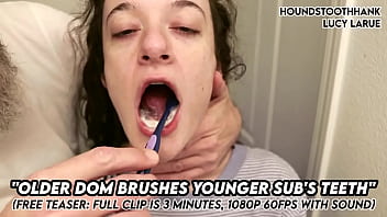 Older dom brushes young subs teeth