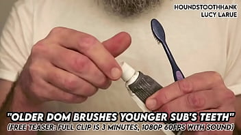 Older dom brushes young subs teeth
