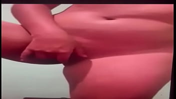 Latina enjoying herself in front of the camera