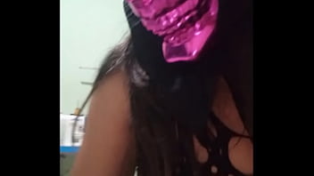 Delicious companion lady wears a mask on halloween to model erotically and touch her vagina