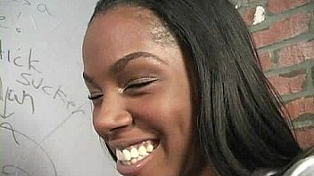 Ebony teen shows off her blowjob skills at gloryhole 25