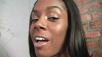 Ebony teen shows off her blowjob skills at gloryhole 25