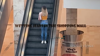 Megan wetting jeans in the shopping mall