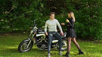 Risky sex on a motorcycle in the park
