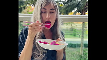 Sexy beauty girl model chopsticks and exotic fruits