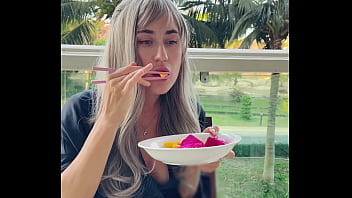 Sexy beauty girl model chopsticks and exotic fruits