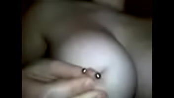 Girlfriend plays with her pierced nipples 4