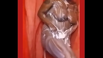 Red curtains and a bath