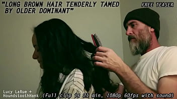 Long brown hair tenderly tamed by older dominant0