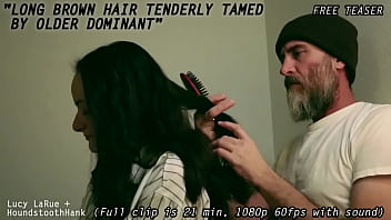 Long brown hair tenderly tamed by older dominant0