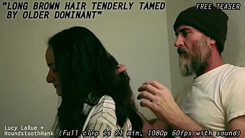 Long brown hair tenderly tamed by older dominant0