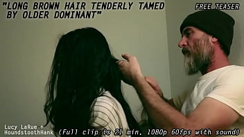 Long brown hair tenderly tamed by older dominant0