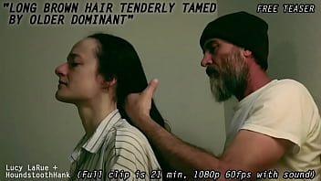 Long brown hair tenderly tamed by older dominant0