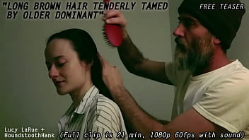 Long brown hair tenderly tamed by older dominant0