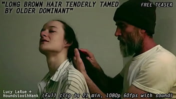 Long brown hair tenderly tamed by older dominant0