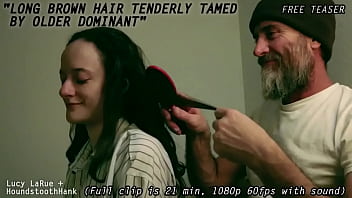 Long brown hair tenderly tamed by older dominant0