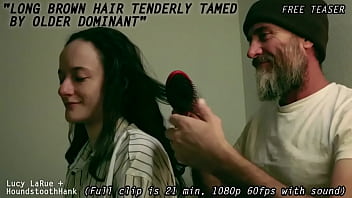 Long brown hair tenderly tamed by older dominant0