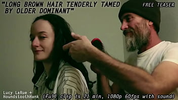 Long brown hair tenderly tamed by older dominant0
