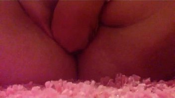 Girl puts hand and things up her cunt