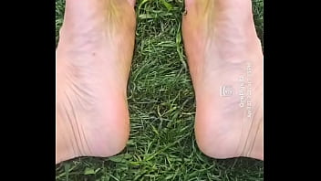 Feet flexing in the grass