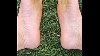 Feet flexing in the grass