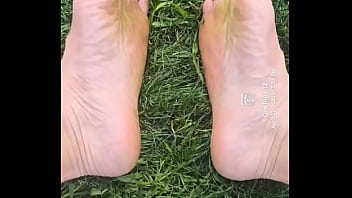 Feet flexing in the grass