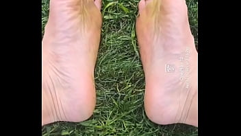 Feet flexing in the grass