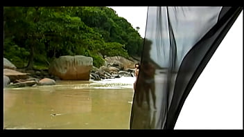 She sucks a cock while kneeling in the water and then hangs on from above as she lowers